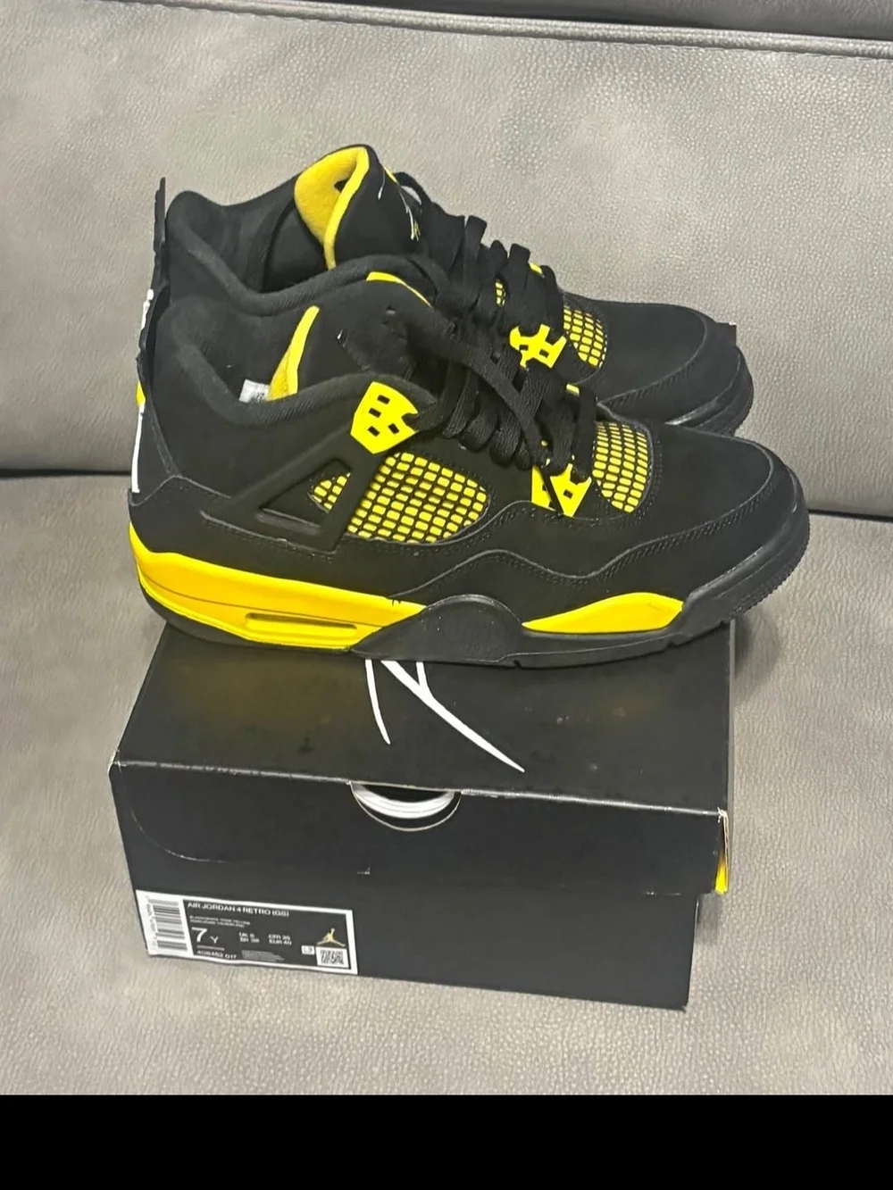 Jordan Men’s Black and Yellow Retro Sneakers